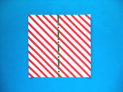piece of paper for making an origami candy cane