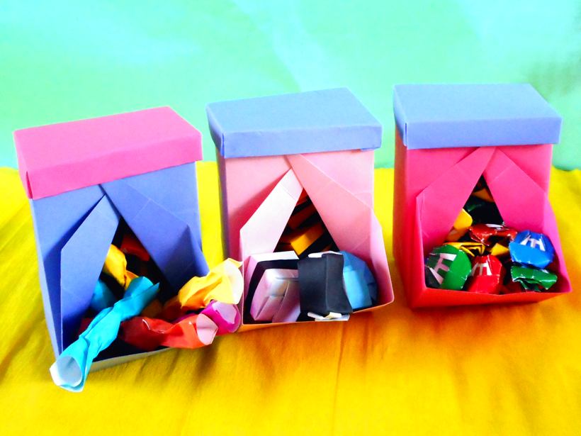 Origami candy dispensers