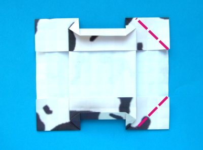 een origami koe met papier knutselen