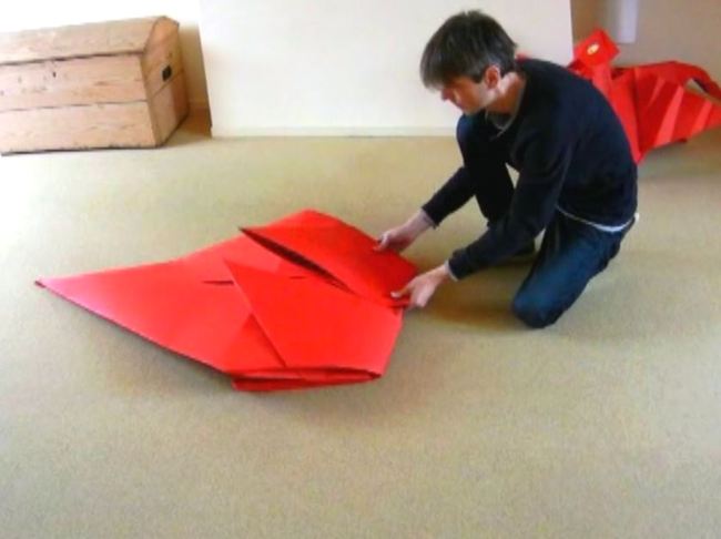 Folding a large Origami Dragon