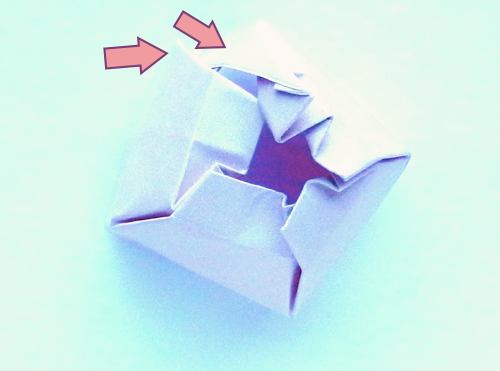Folding an Origami Egg Shaped Box