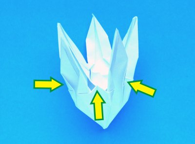 instructions for folding an origami lily with five petals