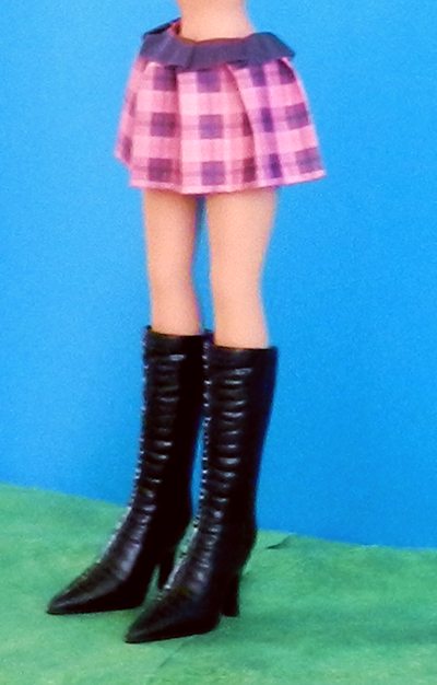 origami plaid skirt and black boots