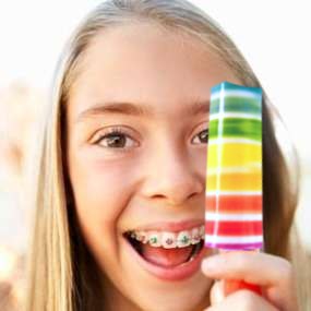 Girl with Fruity Rainbow Popsicle