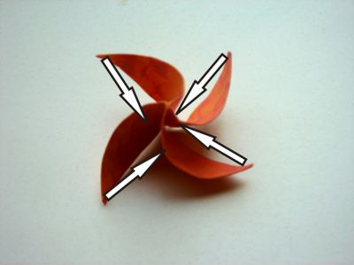 folding a simple origami flower