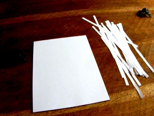 uitleg om een spinnenweb van papier te knutselen
