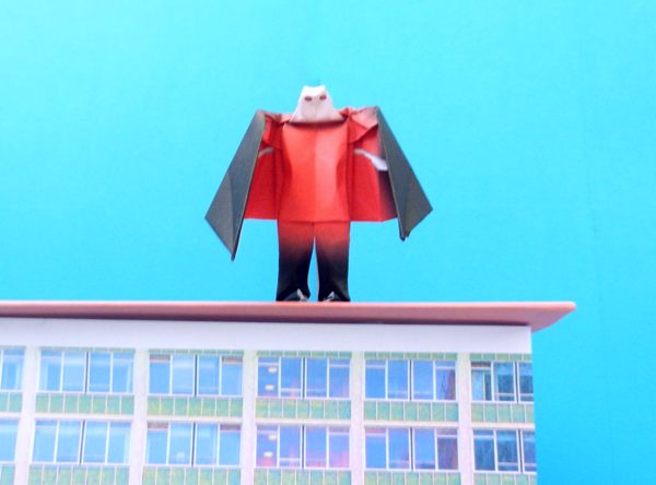 origami vampire on a roof of a flat