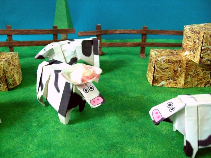 origami cow with a hat