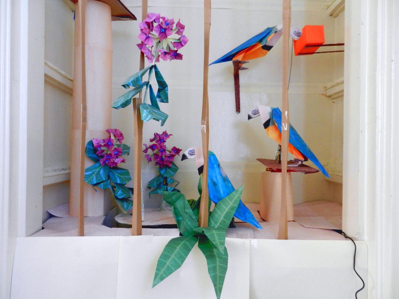 Printable card of an origami parrot cage