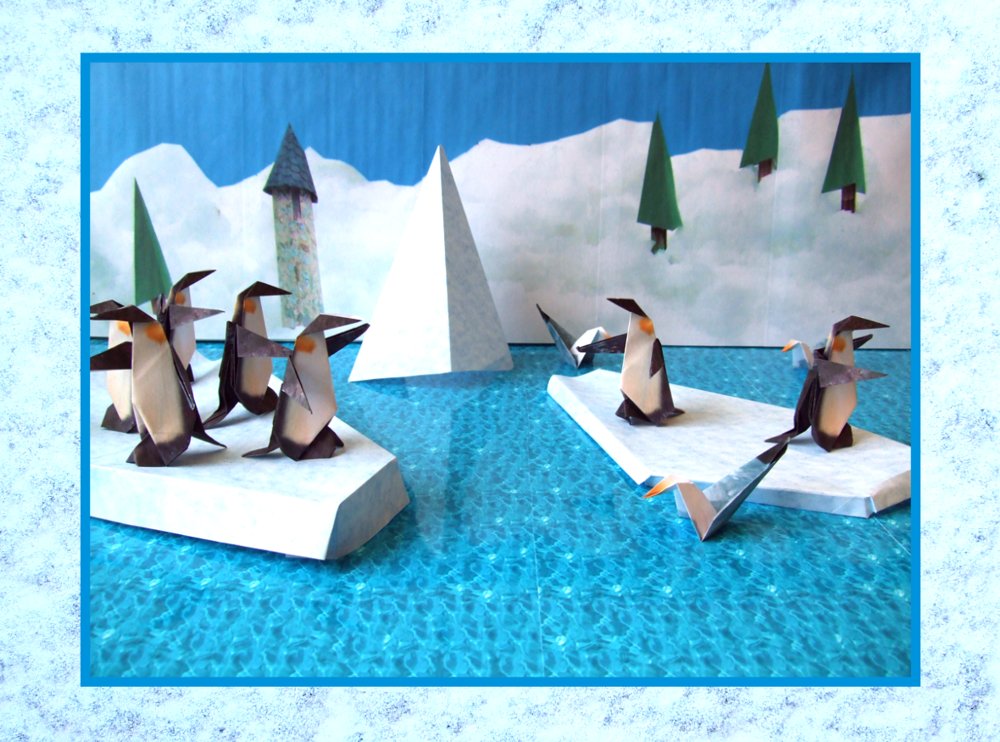 free card of origami penguins on the ice