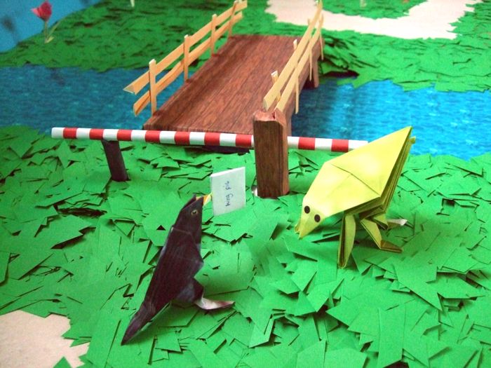 kirigami bridge with an origami bridge keeper
