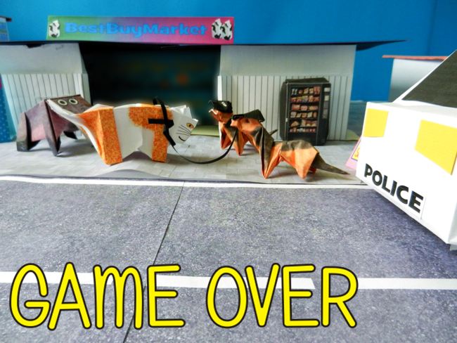 origami dog cops and a cat prisoner