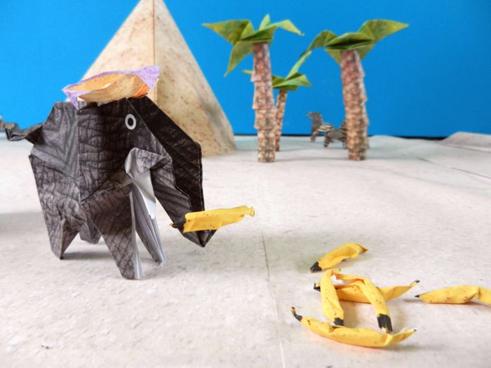 origami elephant having bananas for dinner