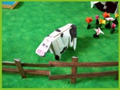 jigsaw puzzle of a funny origami cow on a farm