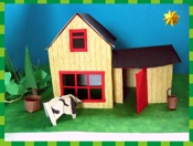 legpuzzel van een koe bij een houten huisje