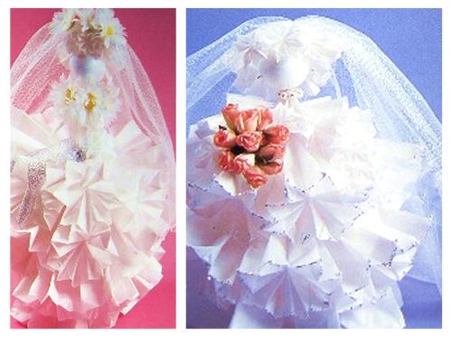 Paper origami flower doll in a wedding dress