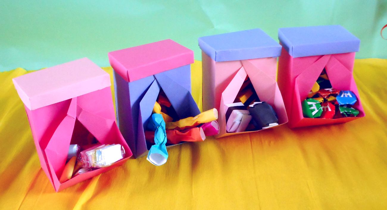 Origami candy dispensers