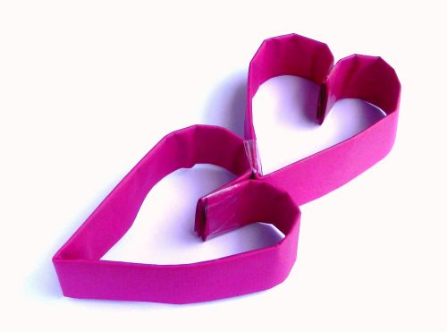 Making a pink paper Heart Garland