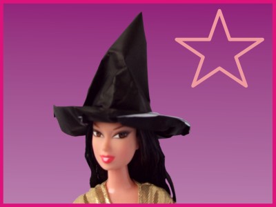 barbie doll dressed with an origami witch hat