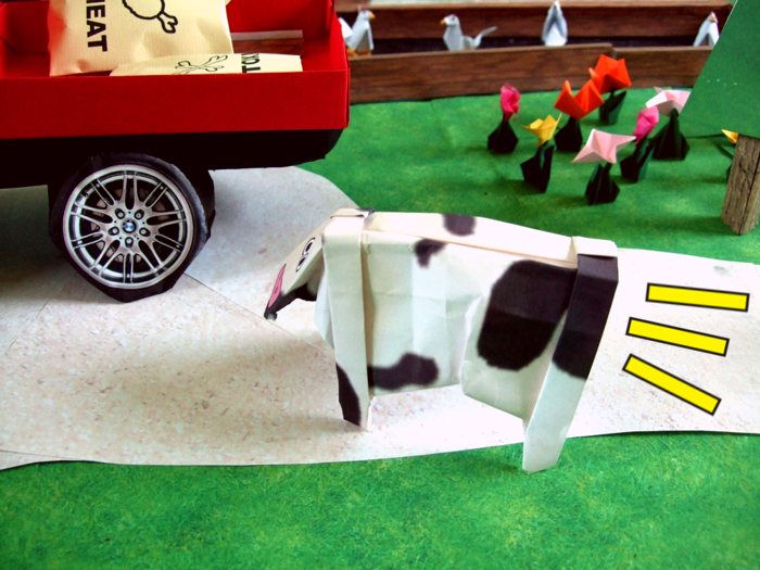 origami cow running as fast as she can