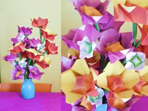 kaartje van gevouwen origami bloemen