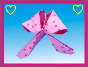 Kawaii card with a pink origami polkadot bow