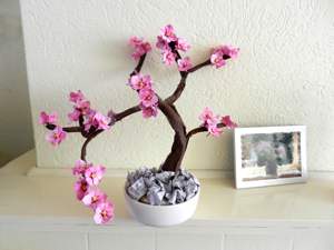 Bonsai Origami Dogwood with pink blooming flowers