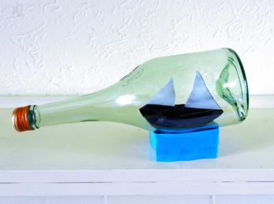 Origami boat in a bottle