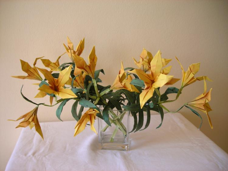 Card with origami lilies in a vase