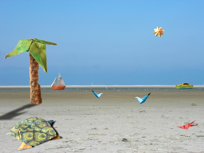 Origami dieren op het strand