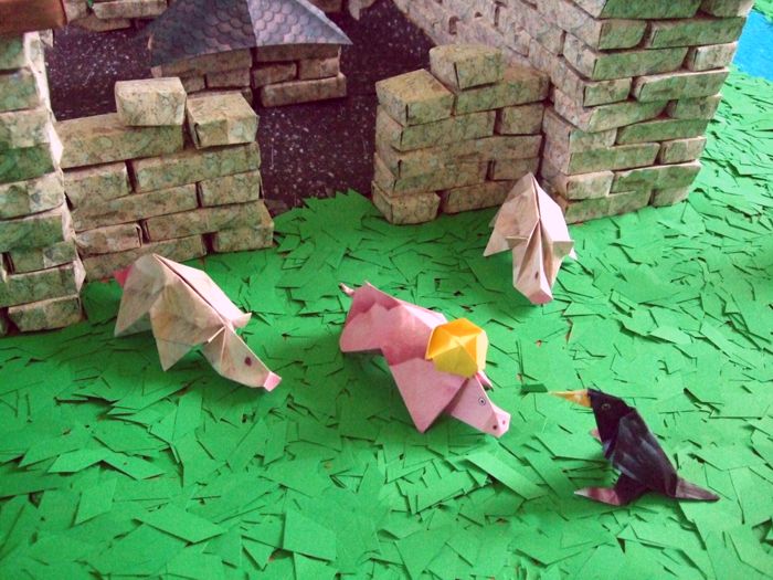 origami pig with a crown on his head