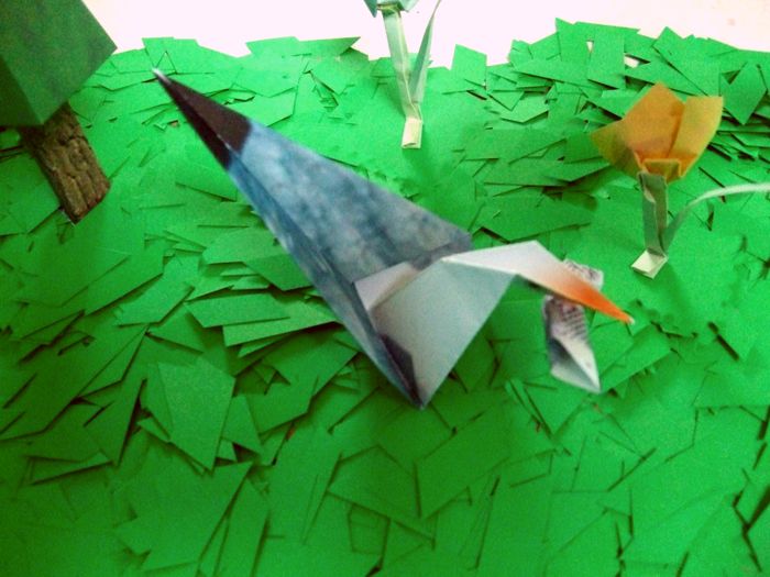 origami gull eating a nice fish