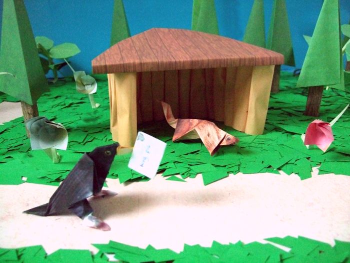 origami squirrel in his kirigami house