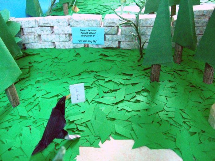 bird standing in front of an origami wall