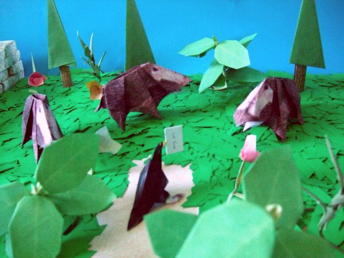 wild boars in an origami forest