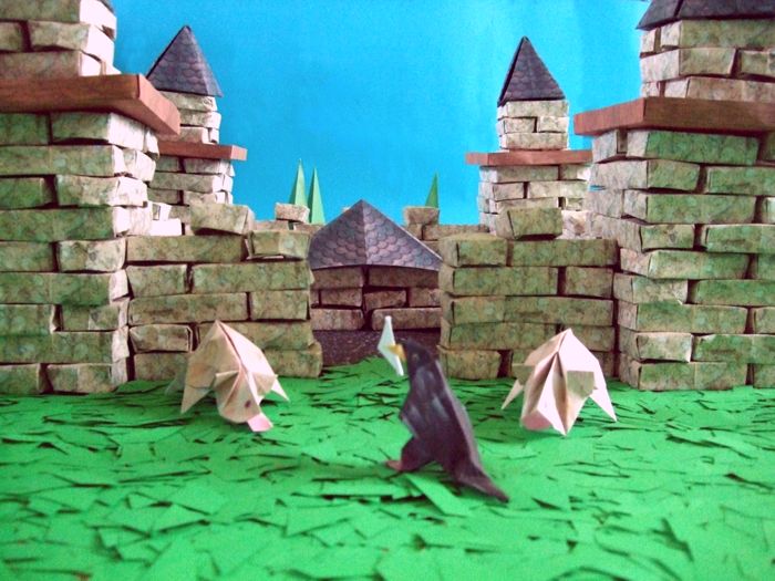 rats in front of an origami castle