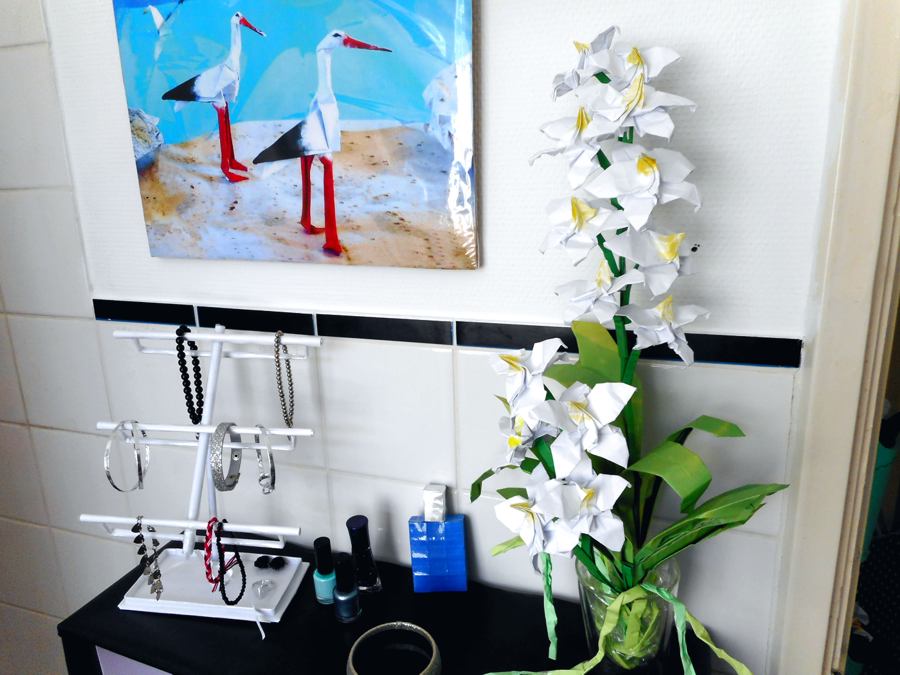 Origami flowers in a bathroom