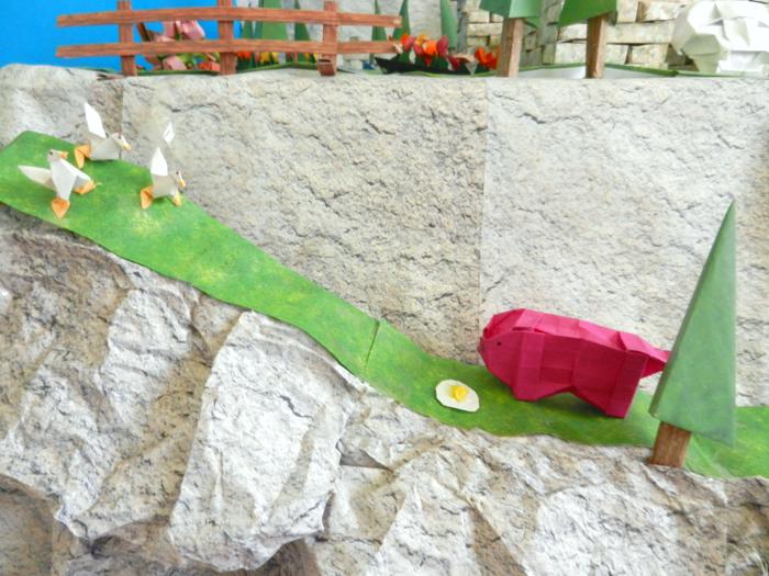 origami farm animals on a mountain path