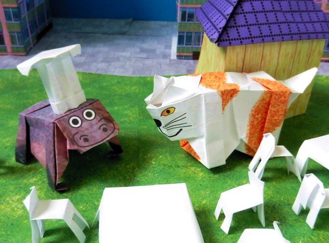 origami chef talking to a cat