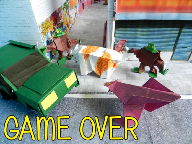 origami zombies and a monster threatening a cat