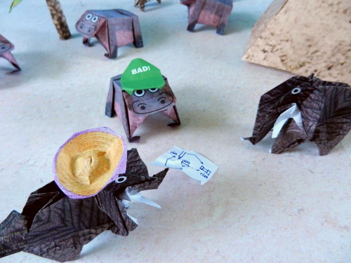 origami hippos and elephants in the desert