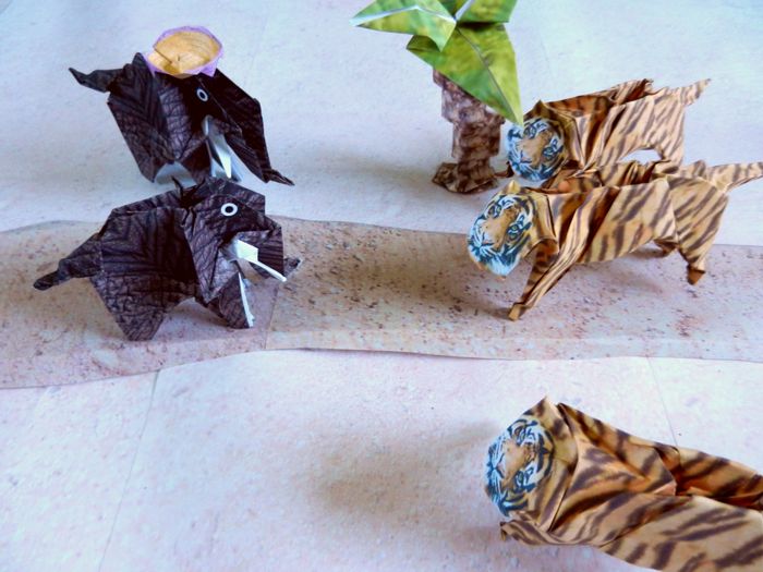 dangerous looking origami tigers in the desert