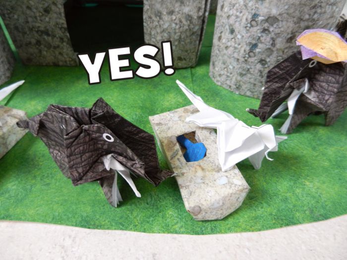 origami elephants at a paper desert castle