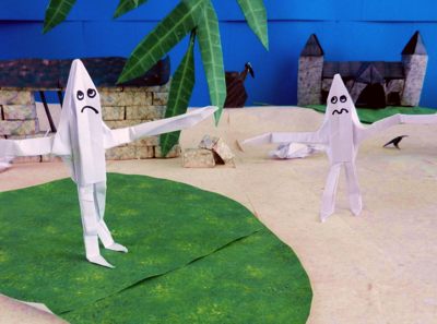 cartoon jigsaw puzzle with very skinny origami ghosts