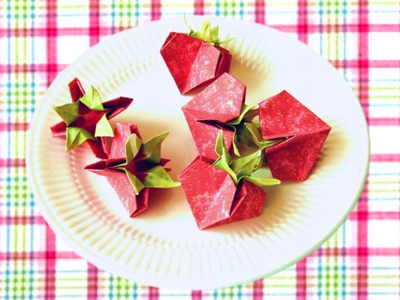 kawaii jigsaw with papercraft strawberries on a plate